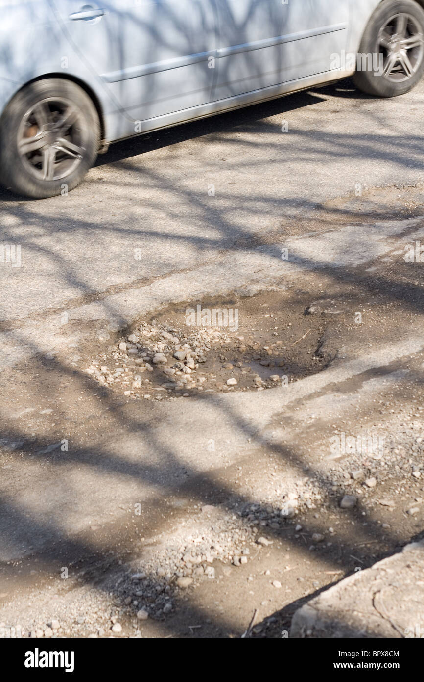 Hole in driveway hires stock photography and images Alamy